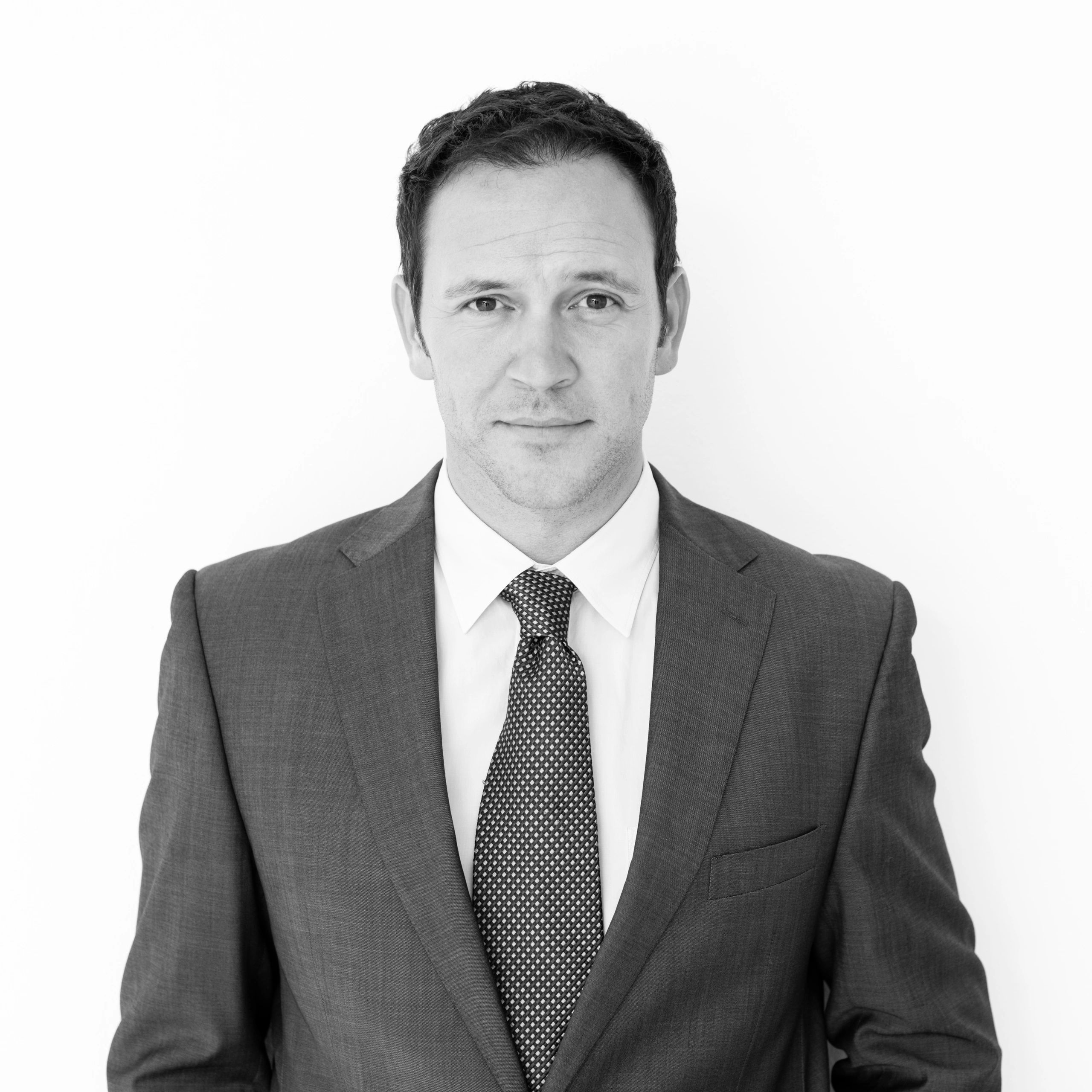 Professional headshot representing partnerships lead