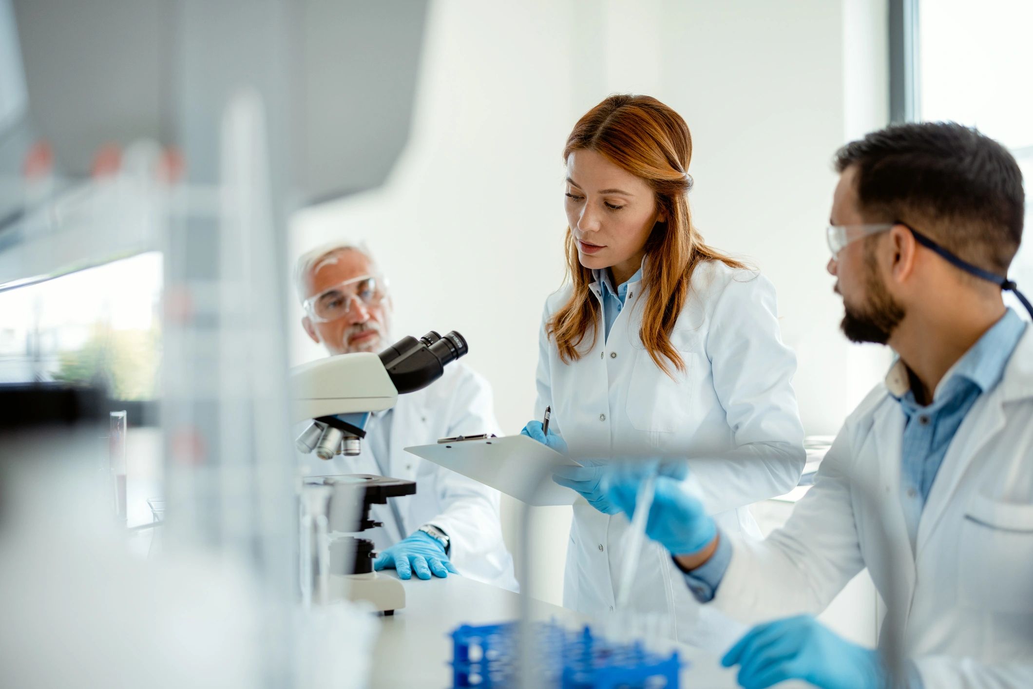 Research team in a lab representing collaborative pilot work